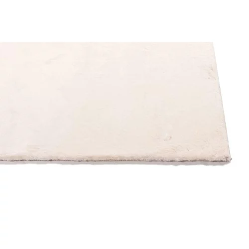 Pour un extérieur plus pratique:Tapis fausse fourrure coloris beige - 70 x 140 cm